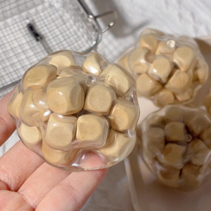 Wooden Noisy Ball Squishy Toy  - Kids Toys Entertainer recension och pris